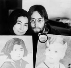 John and Yoko Lennon with their Plastic Ono Band albums